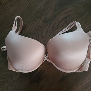 Nude twist front push up bra